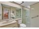 Clean bathroom with shower stall, toilet and vanity at 1120 Tartan Dr, Palm Harbor, FL 34684