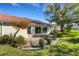 Home's exterior with red tile roof and patio at 1120 Tartan Dr, Palm Harbor, FL 34684