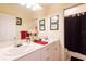 Clean bathroom with double sinks and a shower/tub combo at 4202 W Culbreath Ave, Tampa, FL 33609