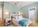 Light and airy bedroom with a comfortable queen-size bed and en-suite bathroom at 4202 W Culbreath Ave, Tampa, FL 33609