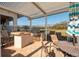 Outdoor kitchen and dining area with pergola at 10851 Mangrove Cay Ne Ln # 1112, St Petersburg, FL 33716