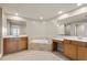 Bathroom with double vanity and large soaking tub at 10851 Mangrove Cay Ne Ln # 1112, St Petersburg, FL 33716