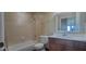 Clean bathroom with a shower/tub combo and vanity at 10851 Mangrove Cay Ne Ln # 1112, St Petersburg, FL 33716