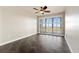 Bedroom with dark tile flooring and sliding glass doors at 10851 Mangrove Cay Ne Ln # 1112, St Petersburg, FL 33716