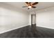 Bedroom with dark tile flooring and ceiling fan at 10851 Mangrove Cay Ne Ln # 1112, St Petersburg, FL 33716