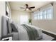 Bright bedroom with large window and ceiling fan at 10851 Mangrove Cay Ne Ln # 1112, St Petersburg, FL 33716