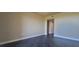 Bright bedroom with tile floors and access to hallway at 10851 Mangrove Cay Ne Ln # 1112, St Petersburg, FL 33716