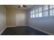 Spacious bedroom with tile floors and large windows at 10851 Mangrove Cay Ne Ln # 1112, St Petersburg, FL 33716