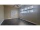 Bedroom with ceiling fan and dark tile floor at 10851 Mangrove Cay Ne Ln # 1112, St Petersburg, FL 33716