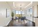 Bright dining area with bay windows and a modern table setting at 10851 Mangrove Cay Ne Ln # 1112, St Petersburg, FL 33716