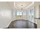 Dining room with bay windows and hardwood floors at 10851 Mangrove Cay Ne Ln # 1112, St Petersburg, FL 33716