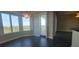 Bright dining room with water views and a chandelier at 10851 Mangrove Cay Ne Ln # 1112, St Petersburg, FL 33716