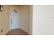 Private condo entry with white door at 10851 Mangrove Cay Ne Ln # 1112, St Petersburg, FL 33716