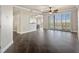 Spacious living room with dark tile floors and sliding doors to balcony at 10851 Mangrove Cay Ne Ln # 1112, St Petersburg, FL 33716