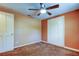 Cozy bedroom with carpet flooring and built-in closet at 1747 Douglas Ave, Dunedin, FL 34698