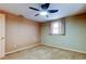 Bedroom featuring a ceiling fan and neutral decor at 1747 Douglas Ave, Dunedin, FL 34698