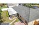 Aerial view of house, highlighting backyard and screened porch at 3722 Village Estates Pl, Tampa, FL 33618