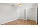 Bedroom with wood-look floors and ceiling fan at 3722 Village Estates Pl, Tampa, FL 33618