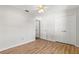 Bedroom with laminate flooring, a ceiling fan and closet at 3722 Village Estates Pl, Tampa, FL 33618