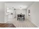 Bright dining area with tile floors and view of kitchen at 3722 Village Estates Pl, Tampa, FL 33618