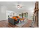 Living room with sectional sofa and access to patio at 3722 Village Estates Pl, Tampa, FL 33618