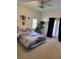 Spacious bedroom with double bed and access to balcony at 6519 Simone Shores Cir, Apollo Beach, FL 33572