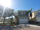 Two-story house with white garage door and landscaping at 6519 Simone Shores Cir, Apollo Beach, FL 33572