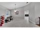 Bright dining area with hardwood floors and built-in shelving at 9719 Pleasant Run Way, Tampa, FL 33647