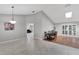 Dining area with hardwood floors and access to living room at 9719 Pleasant Run Way, Tampa, FL 33647