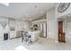 Bright kitchen with island, stainless steel appliances, and white quartz countertops at 9719 Pleasant Run Way, Tampa, FL 33647