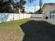 Spacious backyard with a white vinyl fence at 10373 137Th Ln, Largo, FL 33774