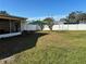 Spacious backyard with a white vinyl fence at 10373 137Th Ln, Largo, FL 33774