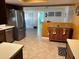 Kitchen with stainless steel appliances and tile flooring at 10373 137Th Ln, Largo, FL 33774