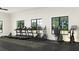 Modern fitness center with treadmills, ellipticals, and weights at 10884 Ibis Brook Ct, Land O Lakes, FL 34638