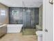 Spa-like bathroom with walk-in shower and soaking tub at 323 30Th N Ave, St Petersburg, FL 33704