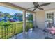 Relaxing front porch with tiled floor and ceiling fan at 323 30Th N Ave, St Petersburg, FL 33704