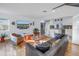 Sunlit living room showcasing hardwood floors and comfy seating at 323 30Th N Ave, St Petersburg, FL 33704