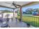 Covered patio with ceiling fan, offering a relaxing outdoor space at 323 30Th N Ave, St Petersburg, FL 33704