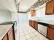 Bright kitchen features granite countertops and stainless steel appliances at 1510 Allegheny Dr, Sun City Center, FL 33573