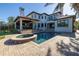 Luxury home with private pool, spa, and expansive patio at 158 Ramon Ne Way, St Petersburg, FL 33704
