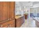 Elegant bathroom with double vanity, granite countertop and large walk in shower at 158 Ramon Ne Way, St Petersburg, FL 33704