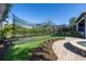 Private backyard batting cage, great for sports enthusiasts at 158 Ramon Ne Way, St Petersburg, FL 33704