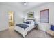 Guest bedroom with en-suite bathroom and comfortable furnishings at 158 Ramon Ne Way, St Petersburg, FL 33704