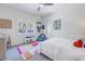 Bright bedroom with window seat and colorful rug at 158 Ramon Ne Way, St Petersburg, FL 33704