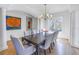 Spacious dining room with light walls and hardwood floors at 158 Ramon Ne Way, St Petersburg, FL 33704
