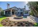 Mediterranean style home with pool and lush landscaping at 158 Ramon Ne Way, St Petersburg, FL 33704