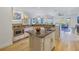 Spacious kitchen with granite countertops, island, and stainless steel appliances at 158 Ramon Ne Way, St Petersburg, FL 33704