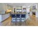 Open kitchen with breakfast bar and island seating at 158 Ramon Ne Way, St Petersburg, FL 33704