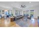 Bright living room with hardwood floors and access to patio at 158 Ramon Ne Way, St Petersburg, FL 33704