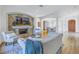 Bright living room with fireplace and hardwood floors at 158 Ramon Ne Way, St Petersburg, FL 33704